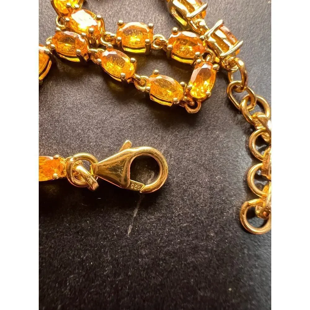 Yellow spessartine garnet tennis bracelet in gold over sterling silver